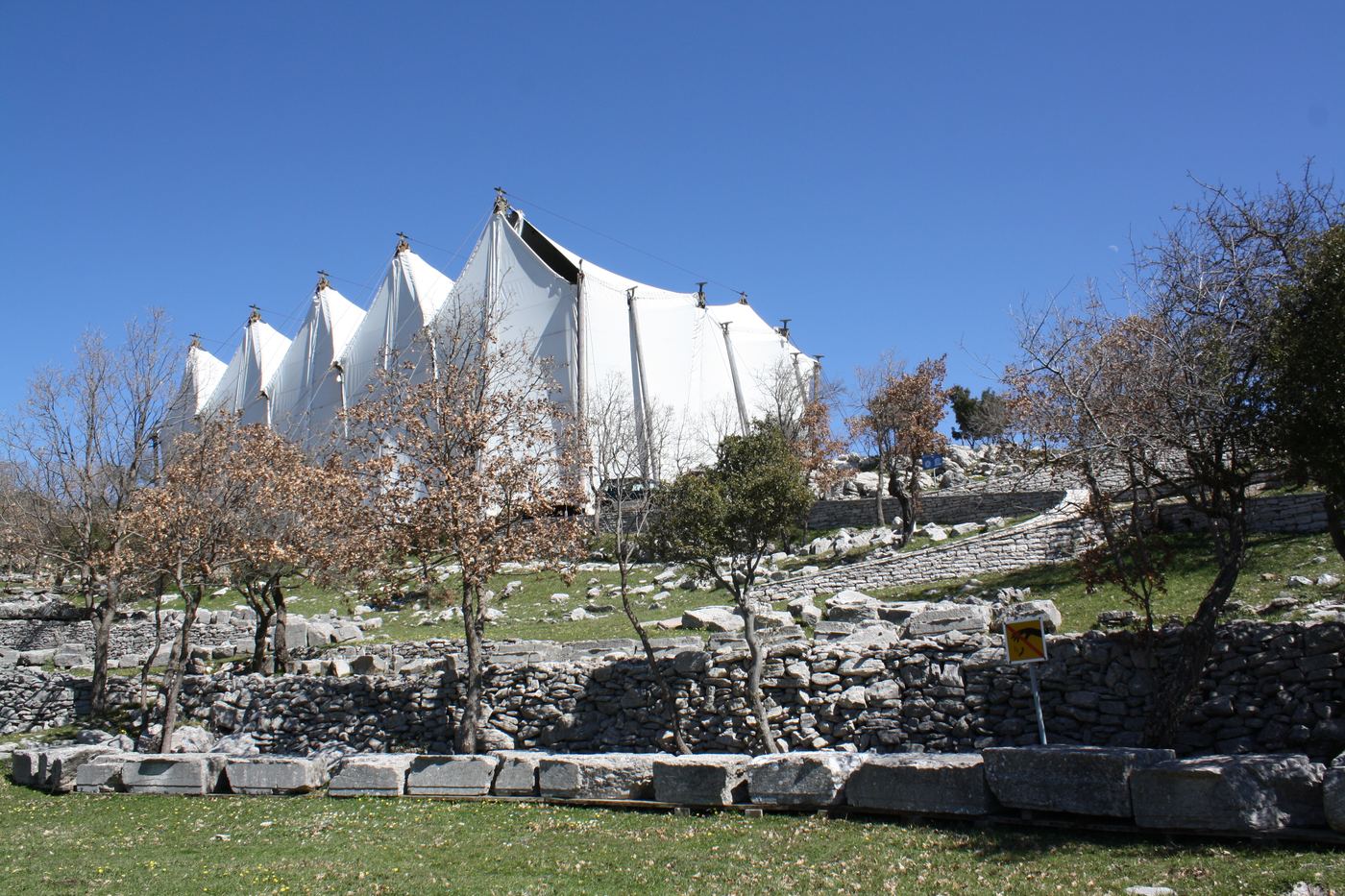 The tent, and the temple, overlooking the site.