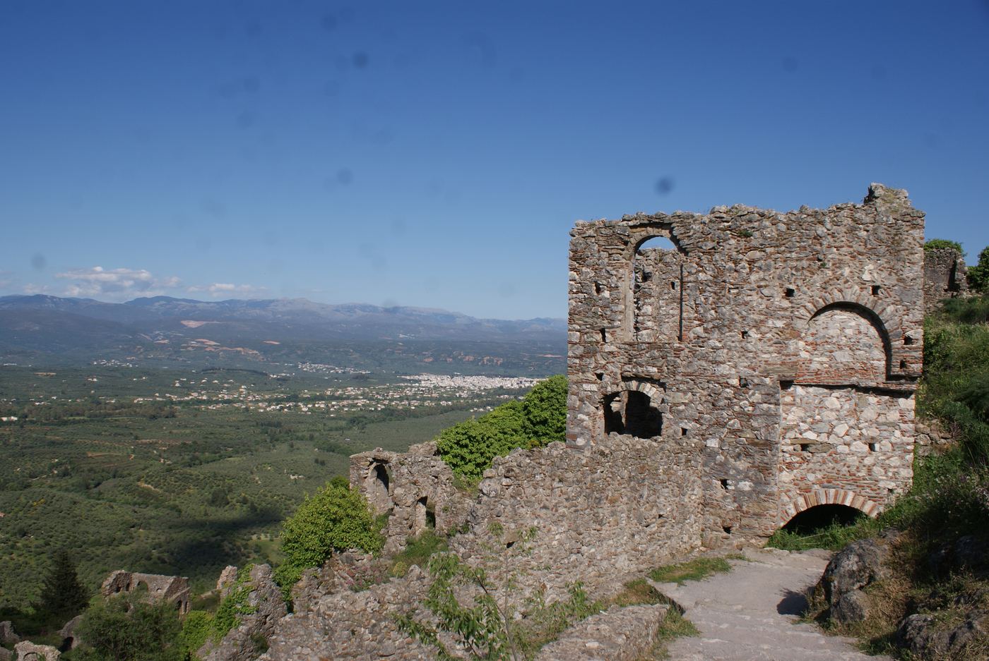 A ruin, and the Laconian plain below.