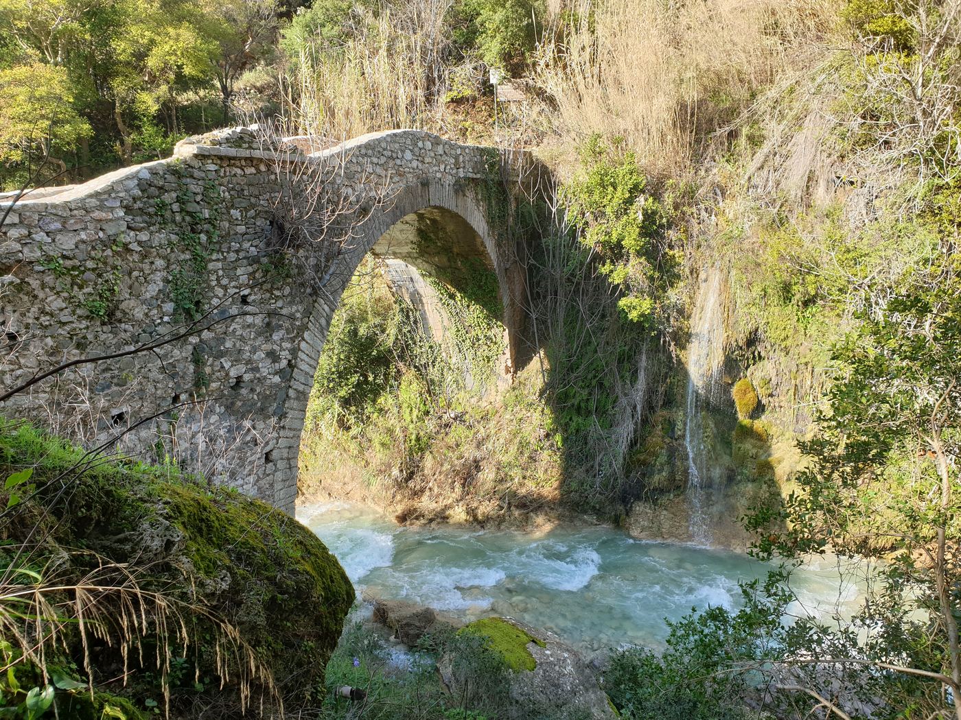 A traditional packhorse bridge at the head of the gorge.