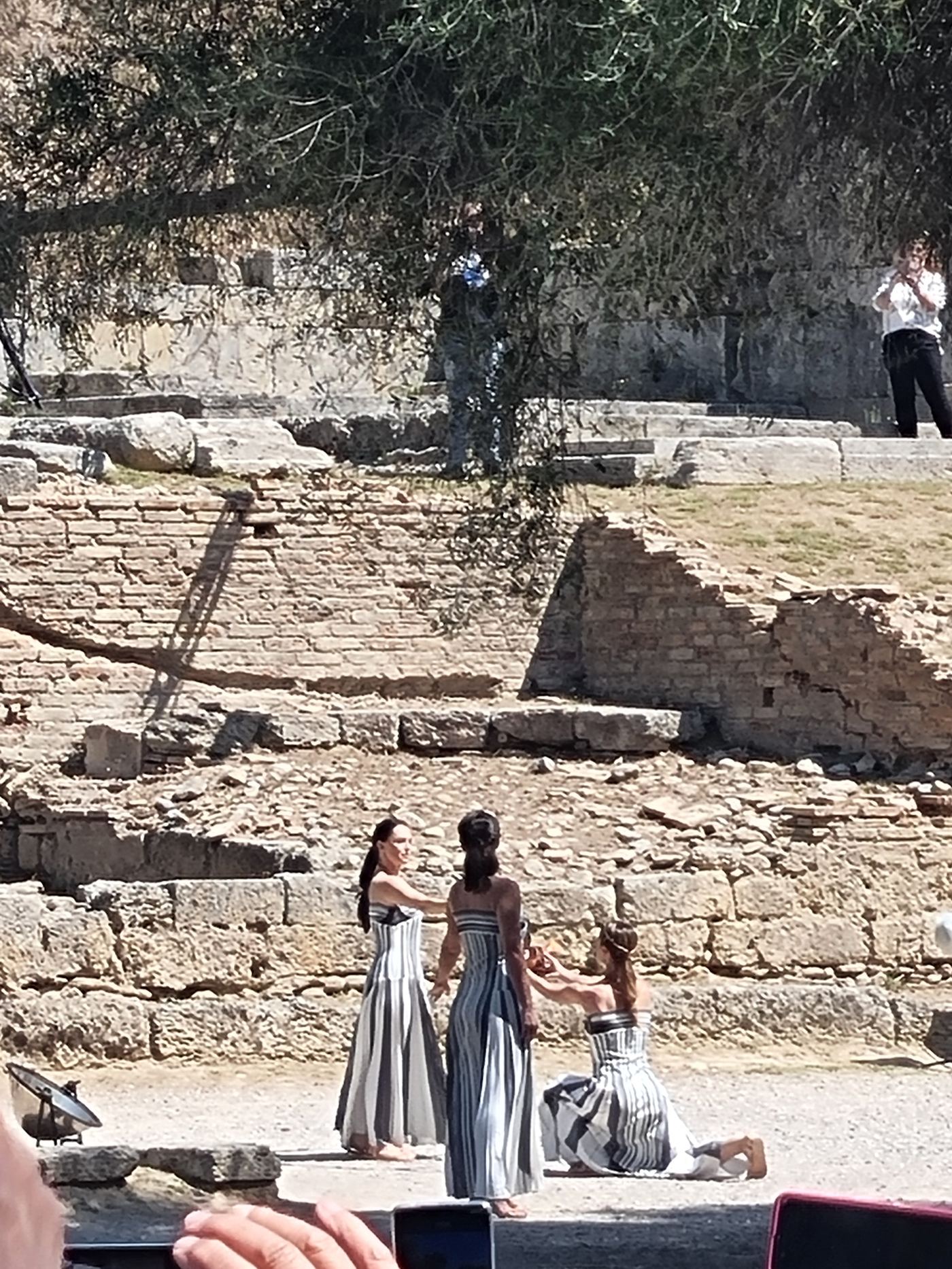 The lighting of the Olympic flame, at Olympia.