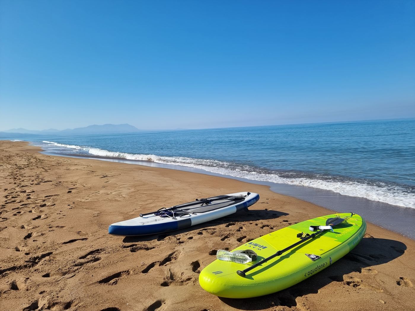 Our paddleboards, on the sand.